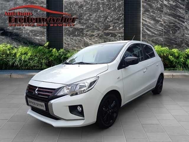 Islandweiß/schwarz Gebraucht 2021 Mitsubishi Space Star Spirit+ Limousine | 10.900 € (Fairer Preis) - Bild 1/4