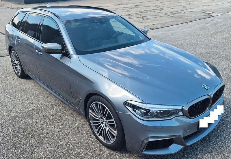 Grau Gebraucht 2018 BMW M550 Shadowline Limousine | 29.490 € (Superpreis) - Bild 1/4