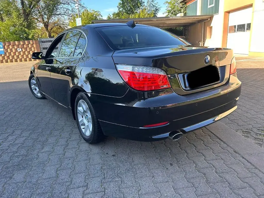Second-hand BMW 520 163 CP (119 kW) 2009 Negru Berlinǎ