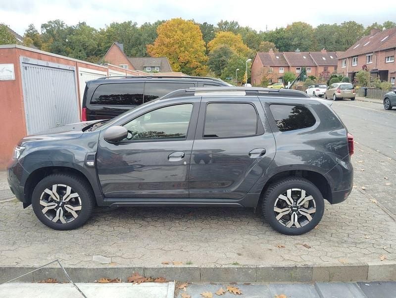 Grau Gebraucht 2024 Dacia Duster Journey SUV | 20.300 € (Superpreis) - Bild 1/4