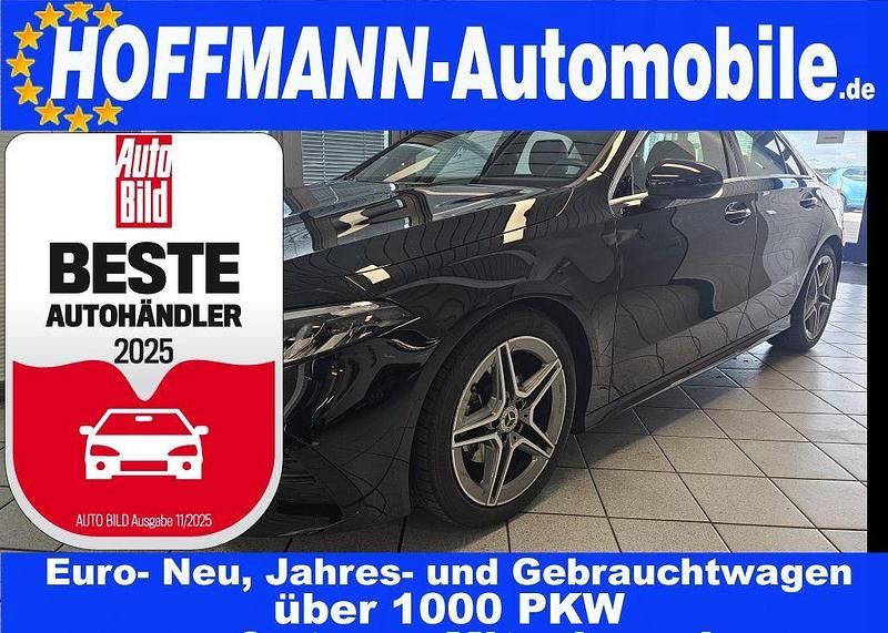 Kosmosschwarz met. (metallic) Gebraucht 2024 Mercedes A180 AMG Limousine | 30.350 € - Bild 1/4