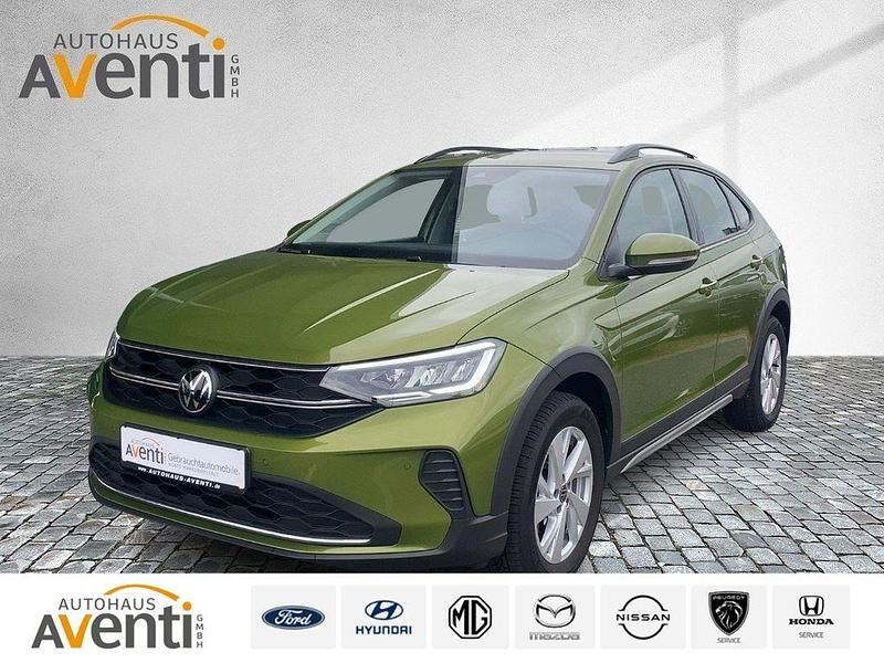 Visual green metallic Gebraucht 2024 VW Taigo Life SUV | 20.217 € (Fairer Preis) - Bild 1/4
