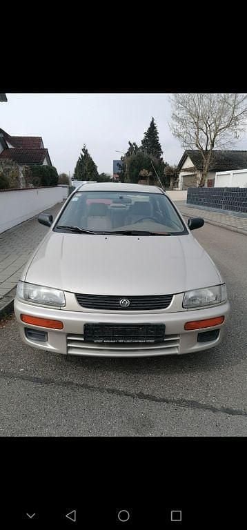 Gebraucht Mazda 323S 88 PS (64 kW) 1996 Beige Limousine