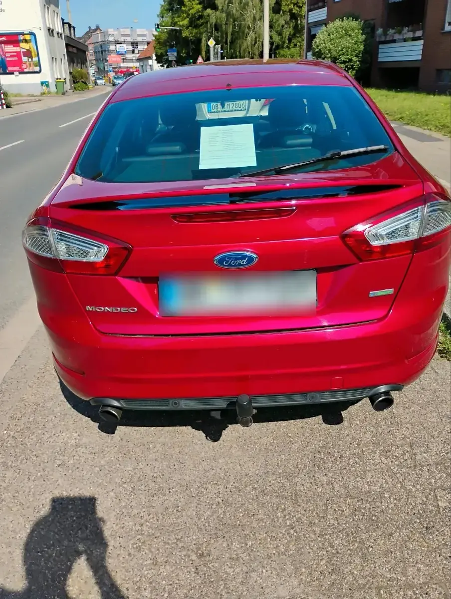 Używany Ford Mondeo 203 KM (149 kW) 2014 Czerwony Sedan/Limuzyna