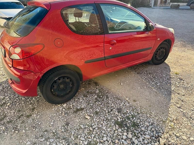 Gebraucht Peugeot 206+ 68 PS (50 kW) 2009 Rot Kleinwagen