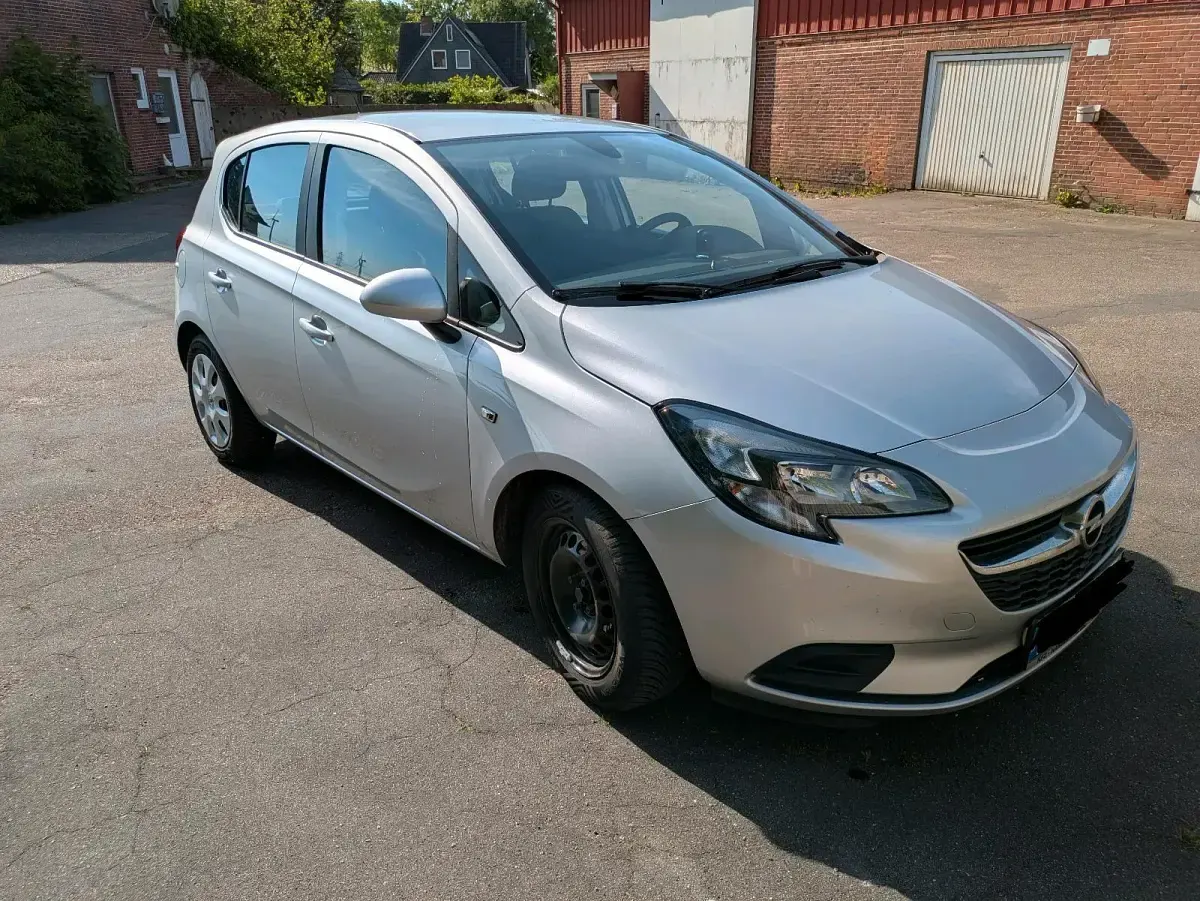 Używany Opel Corsa 95 KM (69 kW) 2016 Srebrny Hatchback