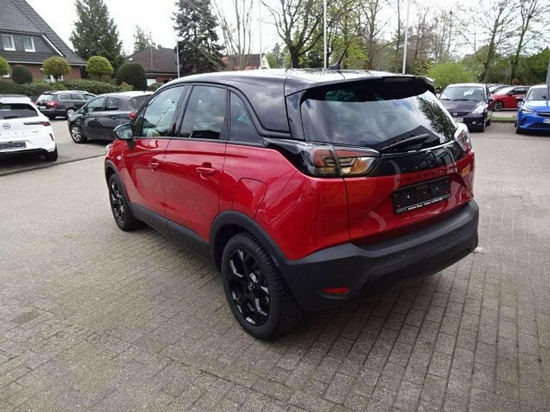 Gebraucht Opel Crossland Elegance 110 PS (80 kW) 2023 Lackierung peperoncino red/met SUV
