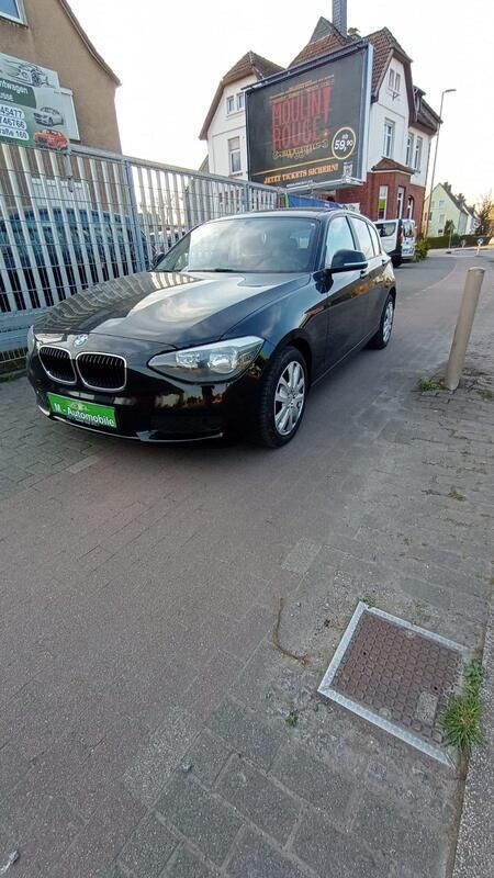 Schwarz Gebraucht 2013 BMW 116 Sport Line Kleinwagen | 5.850 € (Fairer Preis) - Bild 1/4