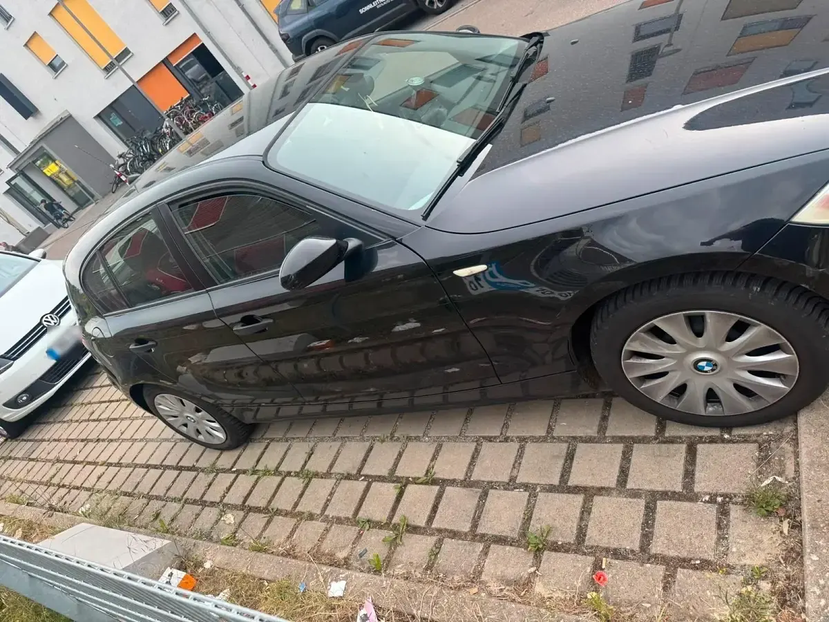 Gebraucht BMW 116 122 PS (89 kW) 2006 Schwarz Kleinwagen
