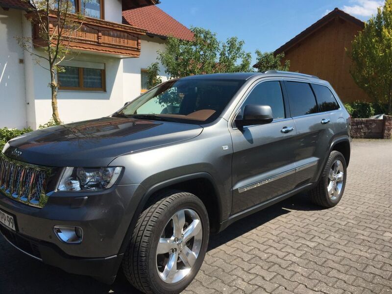 Grau Gebraucht 2012 Jeep Grand Cherokee Overland SUV | 10.900 € (Fairer Preis) - Bild 1/4
