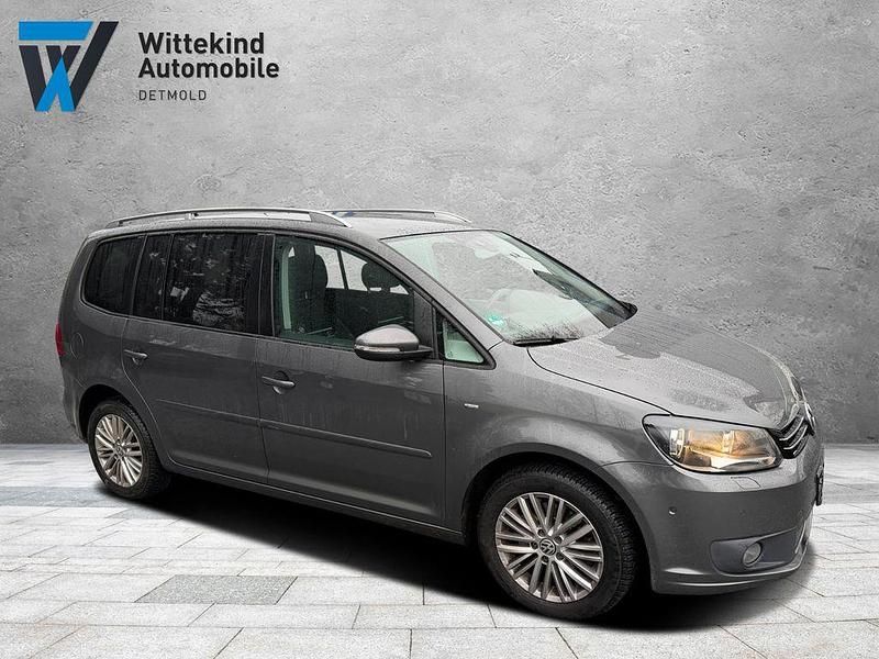 Grau Gebraucht 2015 VW Touran Cup Van / Kleinbus | 8.990 € (Fairer Preis) - Bild 1/4