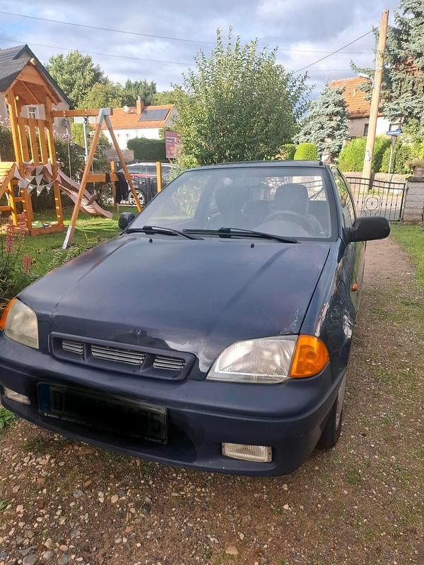 Blau Gebraucht 1997 Suzuki Swift Kleinwagen | 600 € - Bild 1/4