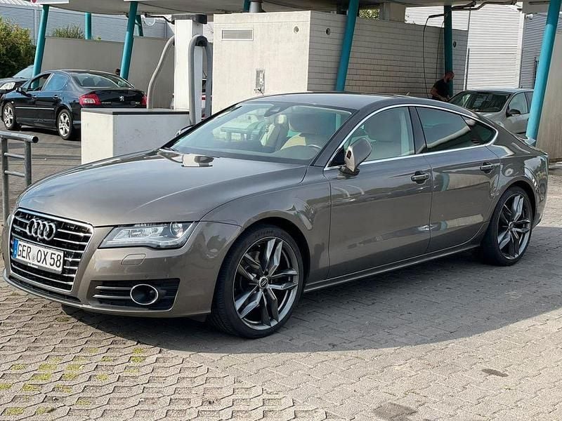 Grau Gebraucht 2013 Audi A7 Sportback Comfort Kleinwagen | 12.999 € (Guter Preis) - Bild 1/4