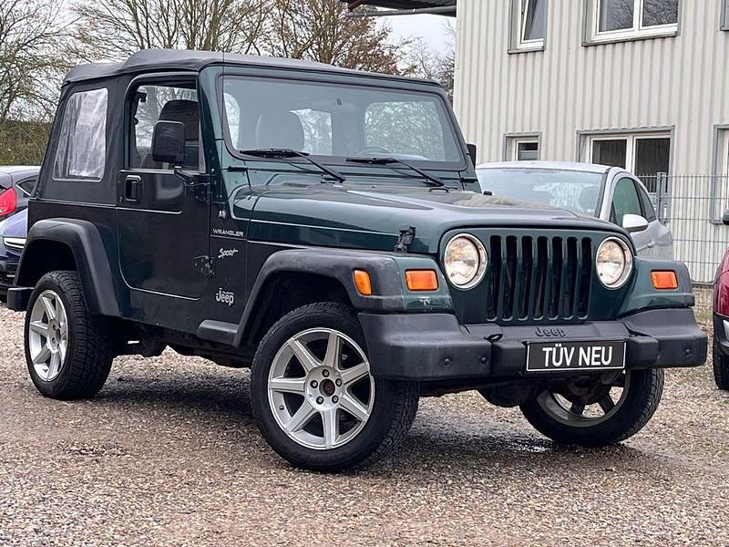 Grün Gebraucht 2001 Jeep Wrangler Sport SUV | 10.999 € (Fairer Preis) - Bild 1/4