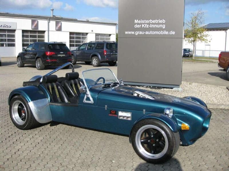 Grün Gebraucht 1994 Lotus Super Seven Cabrio | 29.800 € - Bild 1/4