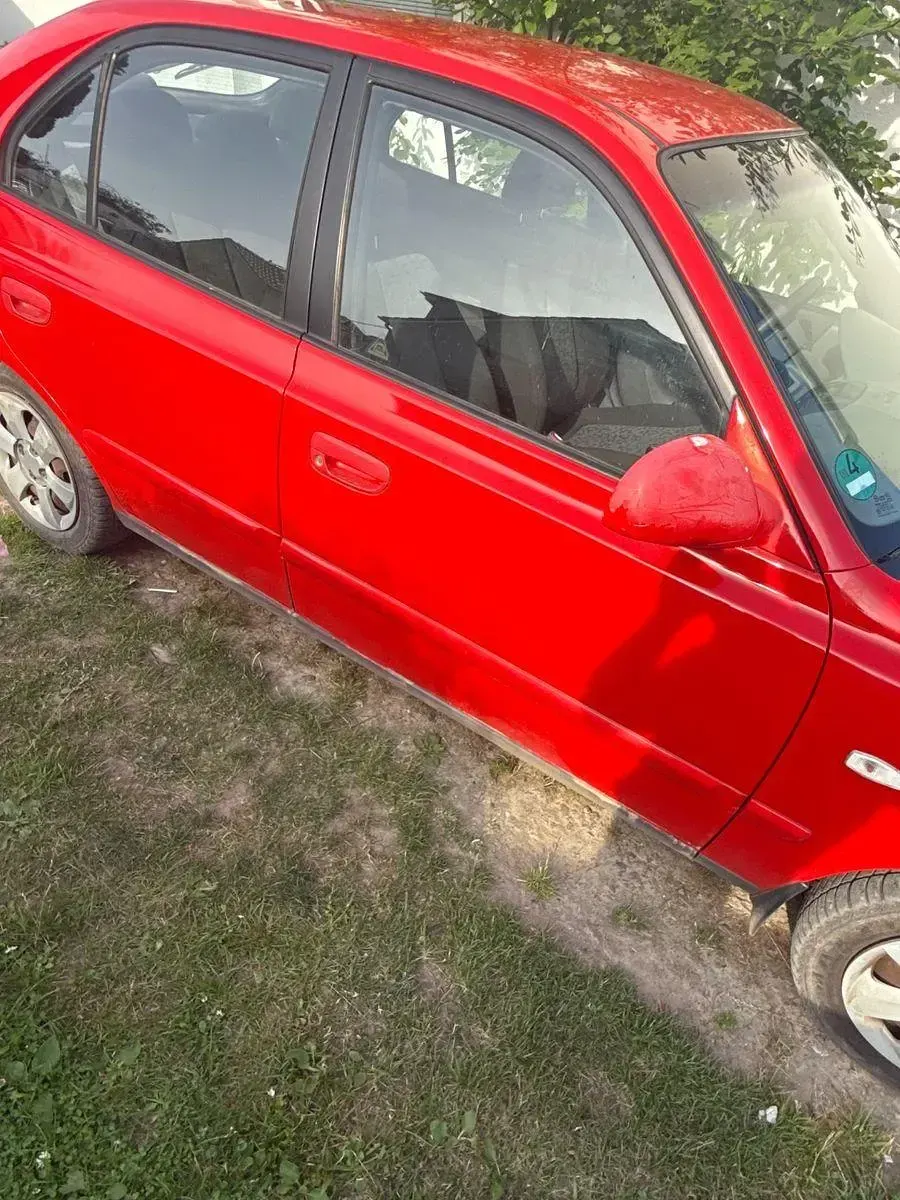 Gebraucht Hyundai Accent GLS 84 PS (61 kW) 2003 Rot Limousine