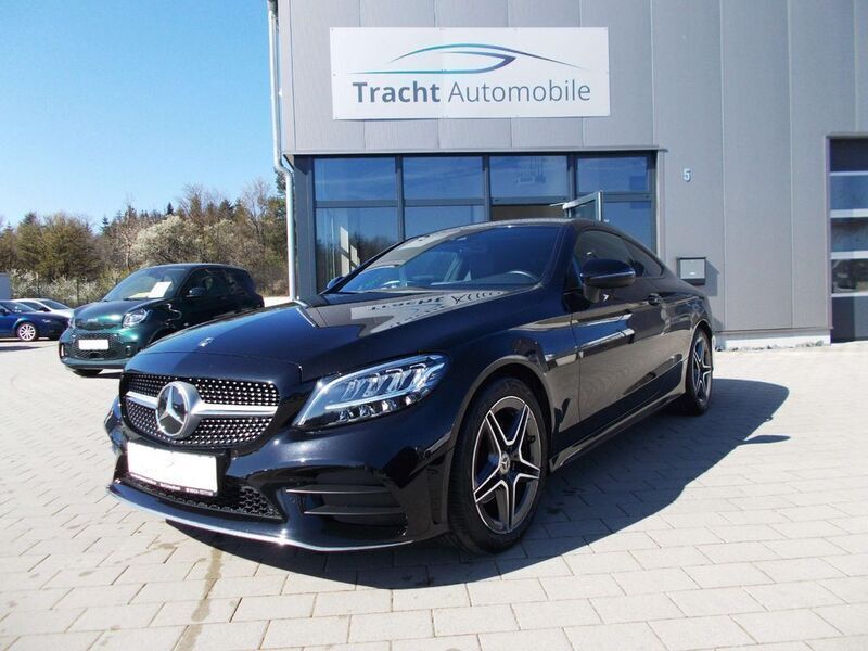 Obsidianschwarz metalliclack Gebraucht 2021 Mercedes C200 AMG Coupé | 34.900 € (Superpreis) - Bild 1/4