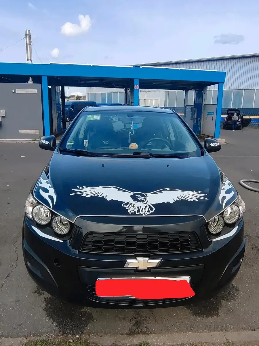 Gebraucht Chevrolet Aveo 86 PS (63 kW) 2013 Schwarz Kleinwagen