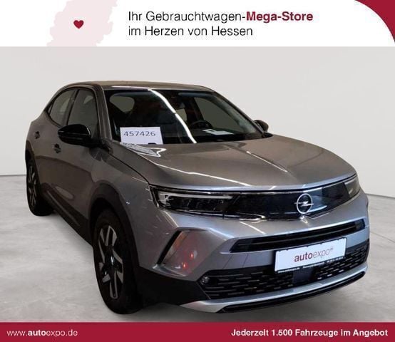 Quarz silber metallic Gebraucht 2021 Opel Mokka-e Elegance SUV | 16.990 € (Fairer Preis) - Bild 1/4