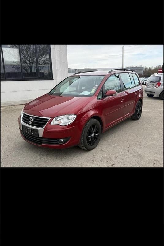 Rot Gebraucht 2007 VW Touran Van / Kleinbus | 5.800 € (Fairer Preis) - Bild 1/4