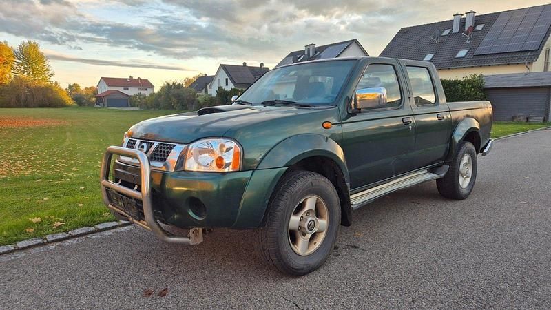 Grün Gebraucht 2003 Nissan Navara Abholung | 4.900 € (Fairer Preis) - Bild 1/4