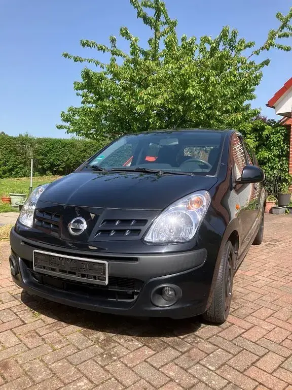 Gebraucht Nissan Pixo Acenta 68 PS (50 kW) 2009 Schwarz Kleinwagen