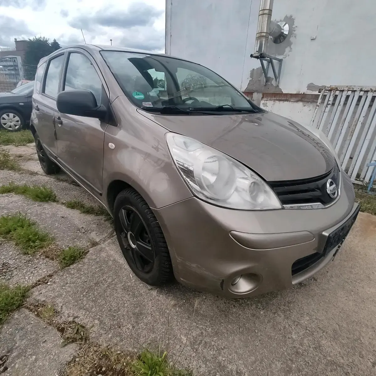 Gebraucht Nissan Note 88 PS (64 kW) 2011 Braun Kleinwagen