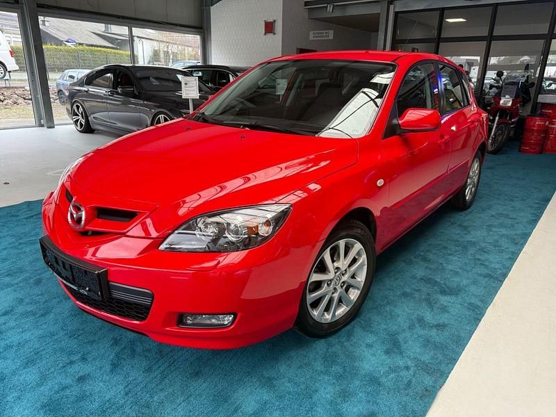 Second-hand Mazda 3 Active 105 CP (77 kW) 2009 Roșu Berlinǎ