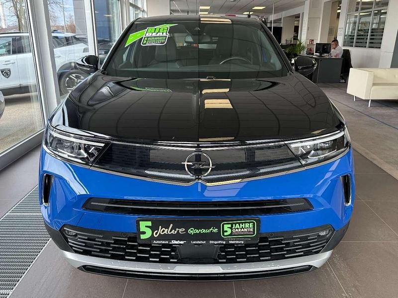 Gebraucht Opel Mokka-e Ultimate 100 kW (136 PS) 2022 Perl blau/voltaik blau SUV