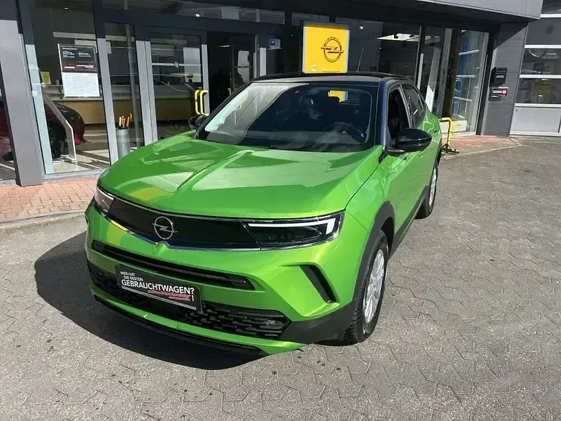 Gebraucht Opel Mokka Enjoy 131 PS (96 kW) 2024 Ikone grün metallic SUV