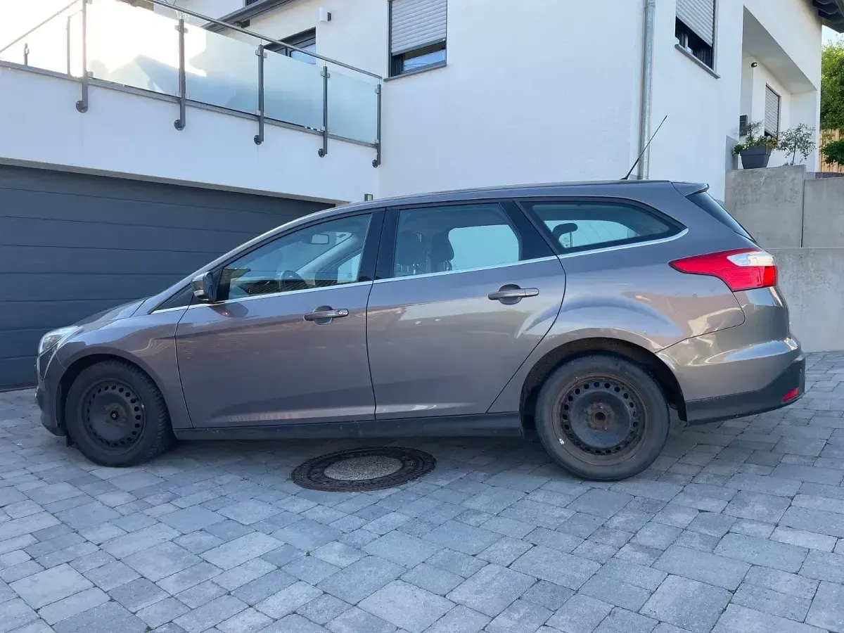 Gebraucht Ford Focus Titanium 116 PS (85 kW) 2014 Braun Kombi