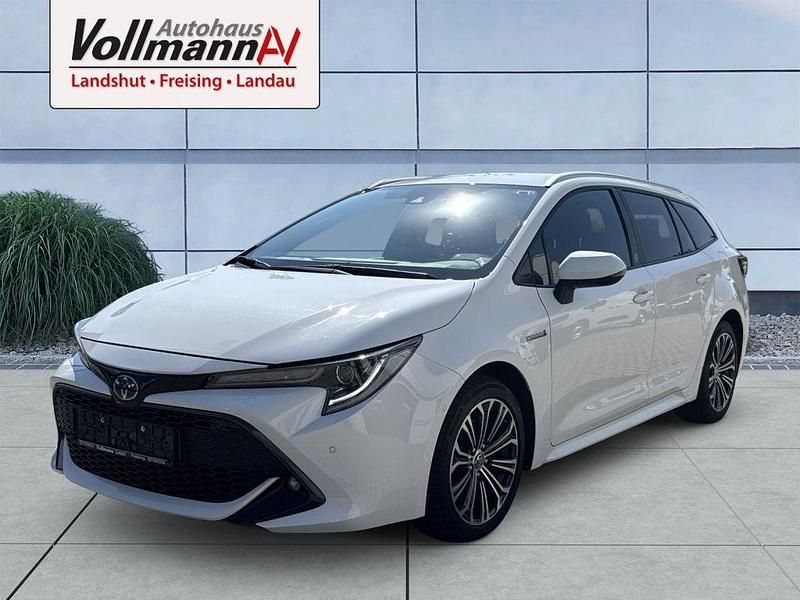 Weiß Gebraucht 2021 Toyota Corolla Team Kombi | 22.490 € (Fairer Preis) - Bild 1/4