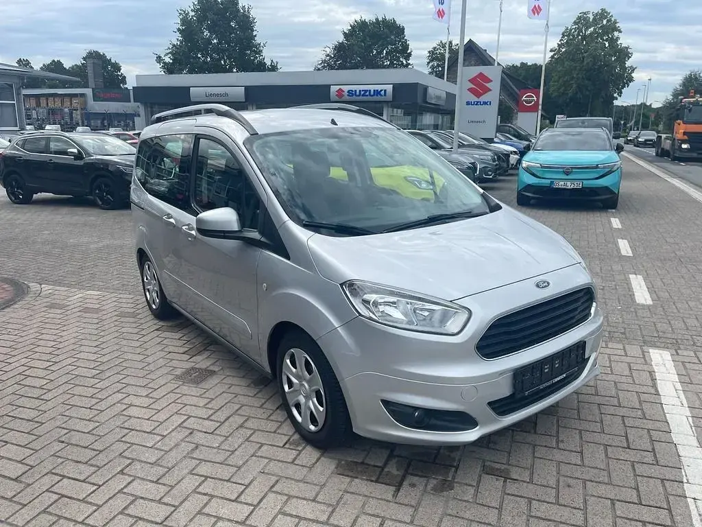 Gebraucht Ford Tourneo Courier Trend 101 PS (74 kW) 2015 Silber Van / Kleinbus