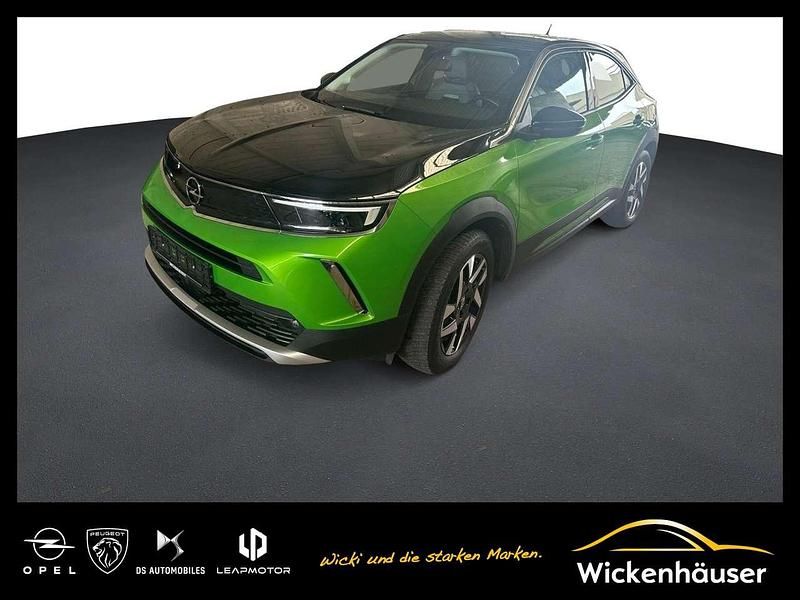 Matcha green/ikone gruen Gebraucht 2022 Opel Mokka-e Elegance SUV | 16.290 € (Fairer Preis) - Bild 1/4