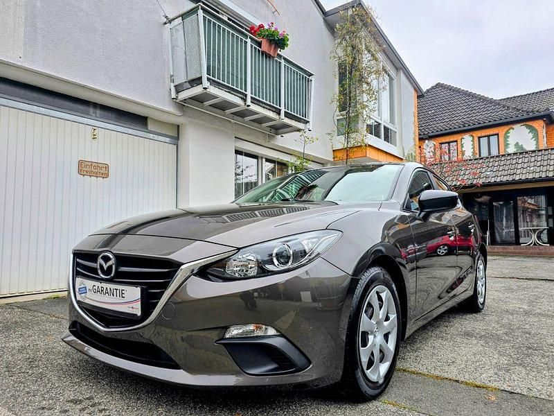 Titanium flash Gebraucht 2015 Mazda 3 Prime-Line Limousine | 10.500 € (Etwas zu teuer) - Bild 1/4