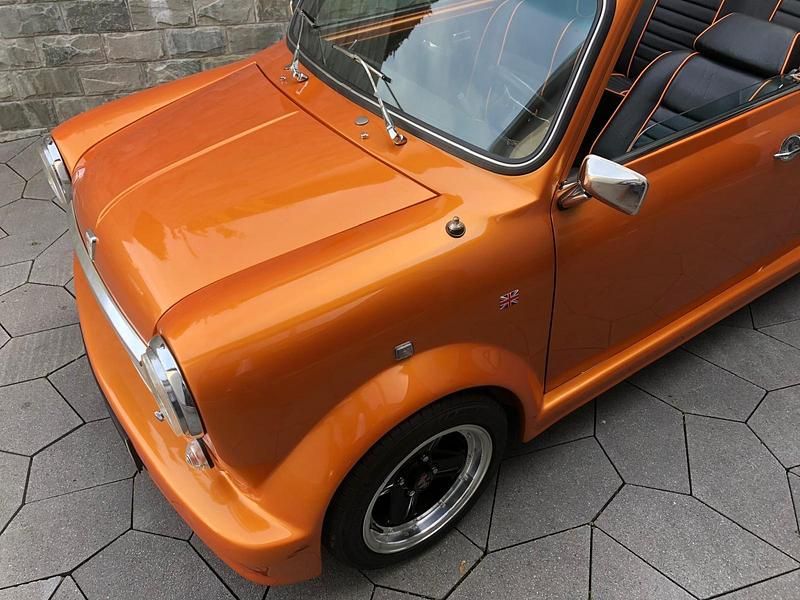 Second-hand Mini 1000 41 CP (30 kW) 1992 Portocaliu Hatchback