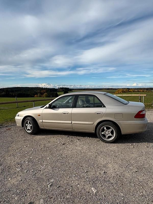 Gebraucht Mazda 626 90 PS (66 kW) 1999 Gold Limousine