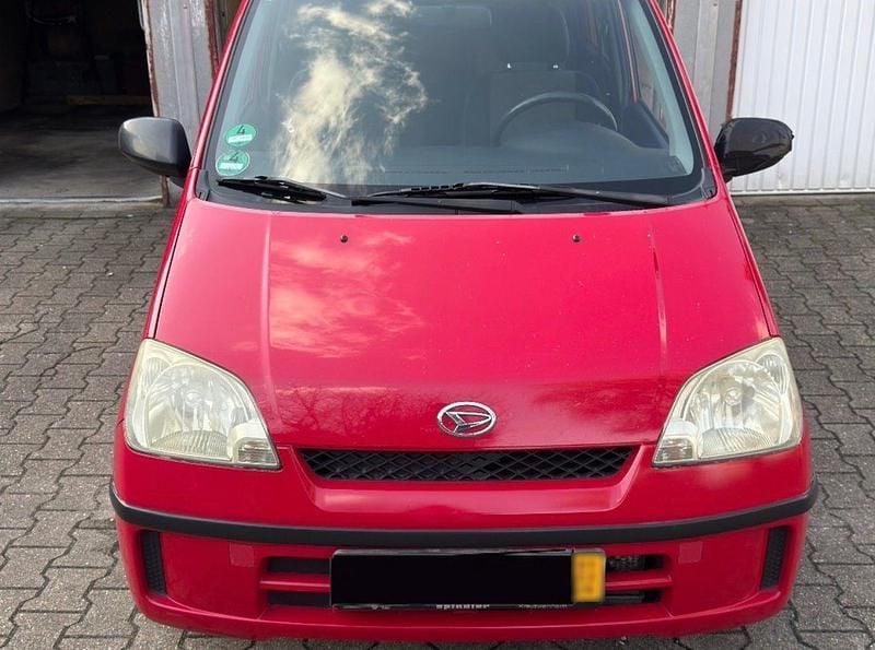 Gebraucht Daihatsu Cuore 58 PS (42 kW) 2003 Rot Kleinwagen