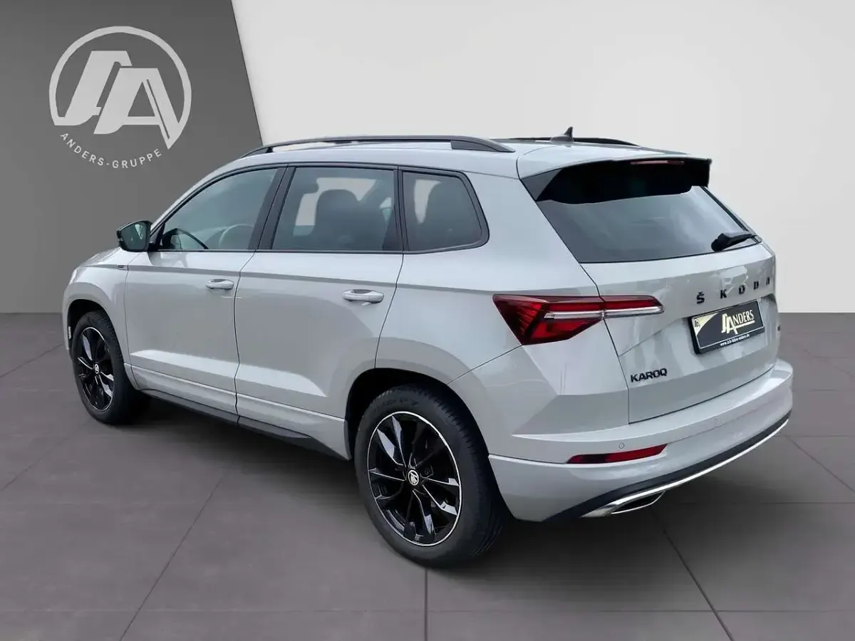 Gebraucht Skoda Karoq SportLine 190 PS (139 kW) 2023 Steel grau SUV