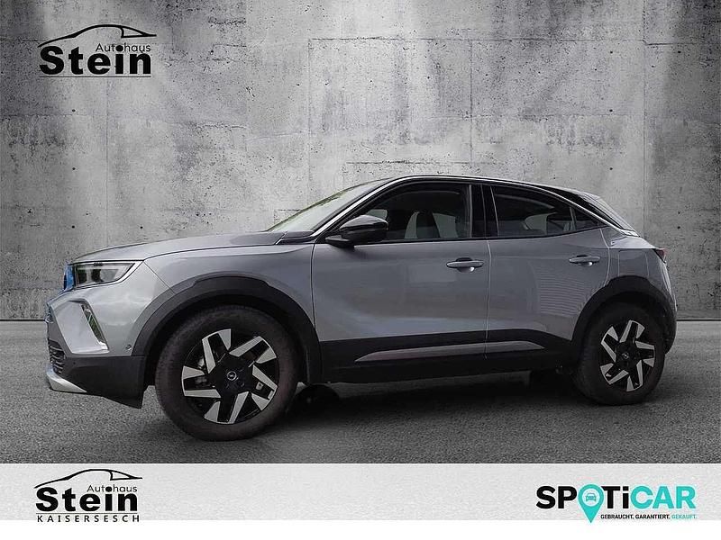 Kontrast grau (metallic) Gebraucht 2022 Opel Mokka-e Elegance SUV | 19.490 € (Etwas zu teuer) - Bild 1/4