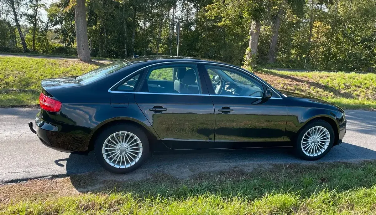 Używany Audi A4 Ambition 150 KM (110 kW) 2014 Czarny Sedan/Limuzyna