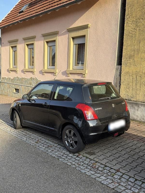 Gebraucht Suzuki Swift 90 PS (66 kW) 2010 Schwarz Kleinwagen