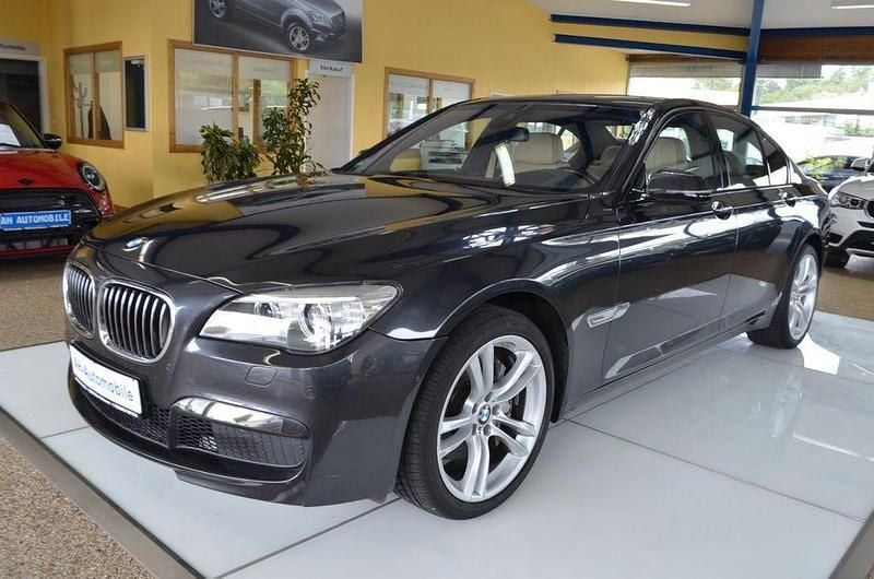 Grau Gebraucht 2014 BMW 740 M Sport Limousine | 25.880 € (Teuer) - Bild 1/4