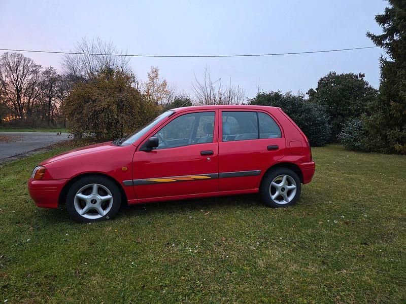 Gebraucht Toyota Starlet 75 PS (55 kW) 1996 Rot Kleinwagen