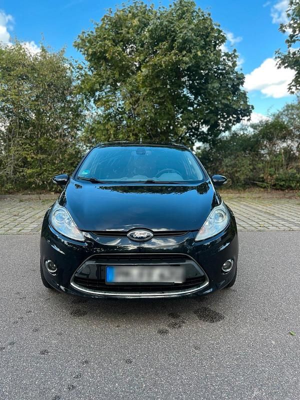 Schwarz Gebraucht 2011 Ford Fiesta Limousine | 2.500 € - Bild 1/4