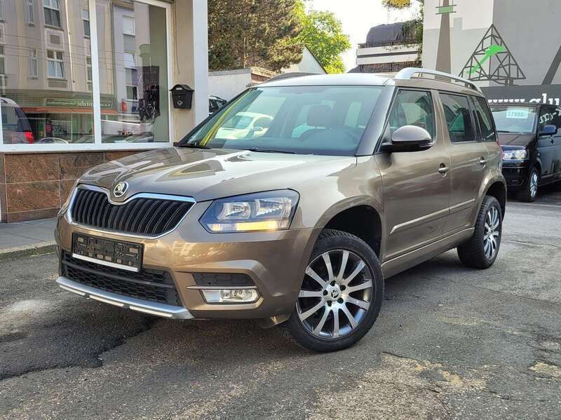 Matobraun metallic Gebraucht 2015 Skoda Yeti SUV | 5.990 € - Bild 1/4