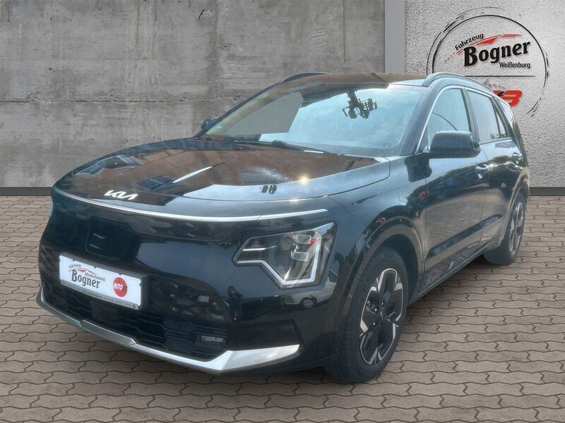 Auroraschwarz Gebraucht 2023 Kia e-Niro Advance SUV | 31.990 € (Fairer Preis) - Bild 1/4