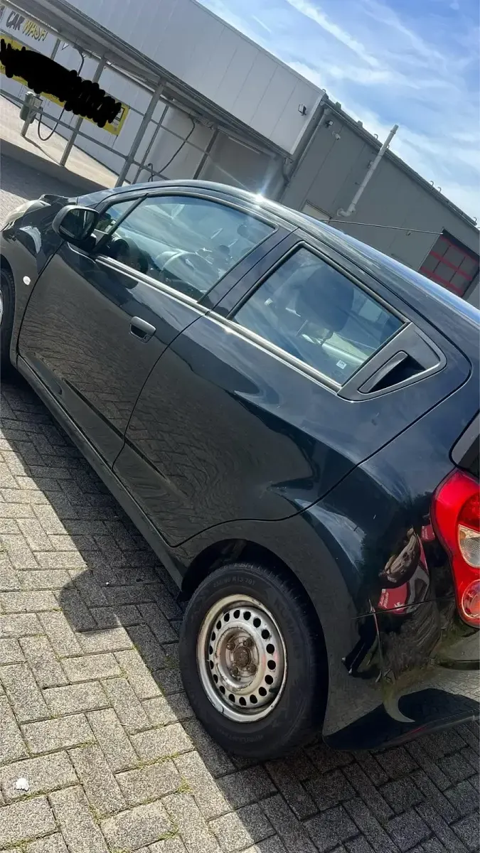 Gebraucht Chevrolet Spark 68 PS (50 kW) 2013 Schwarz Kleinwagen