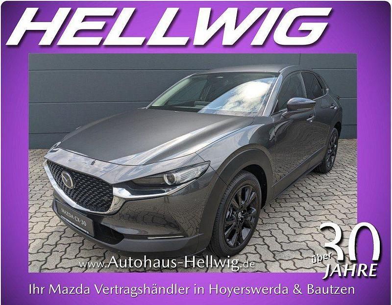 Machine grey metallic Neu 2025 Mazda CX-30 Homura-Line SUV | 27.834 € - Bild 1/4