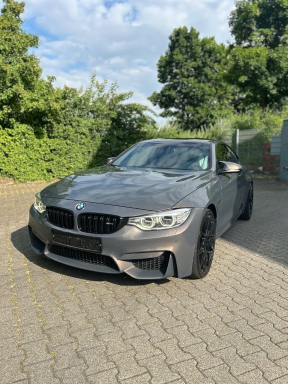 Grau Gebraucht 2016 BMW M4 Sport Line Coupé | 39.490 € (Fairer Preis) - Bild 1/4